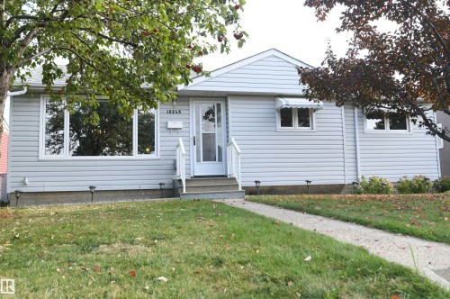 Outstanding value in this 3+2 bedroom bungalow with a gas fireplace, huge rec room, heated oversized garage with 220V, upgraded vinyl windows, recent shingles, high efficiency furnace, all on a quiet street, backing onto the park and ravine in Gold Bar - 10243 42 Street Nw, Edmonton, AB 