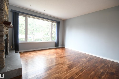 Windows and light in the family spaces;  Once you have had them, it's tough to go back.  The flooring gleams - 10243 42 Street Nw, Edmonton, AB 