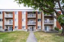 Multi-story building with brick accents and individual balconies - #202 10615 156 St Nw, Edmonton, AB 