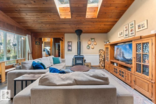 Wood-paneled ceiling with two skylights - #421 61209 Rge Rd 465, Rural Bonnyville M.D., AB 