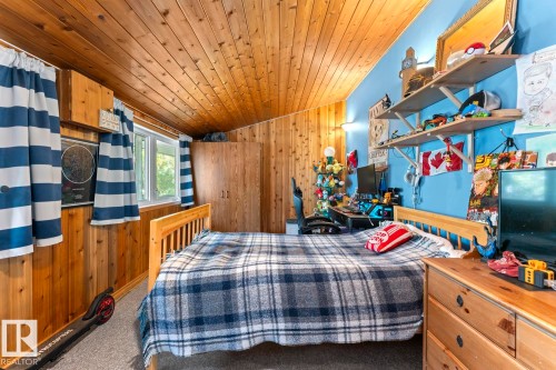 Wood-paneled walls and ceiling - #421 61209 Rge Rd 465, Rural Bonnyville M.D., AB 