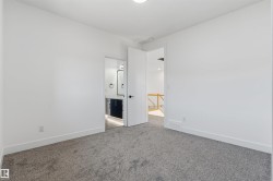 Plush carpet flooring and bright white walls - 