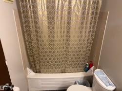 Built-in bathtub with tiled surround - 