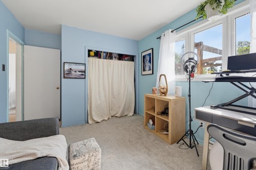 Light-toned wall-to-wall carpeting throughout - 13655 122 Avenue Nw, Edmonton, AB 