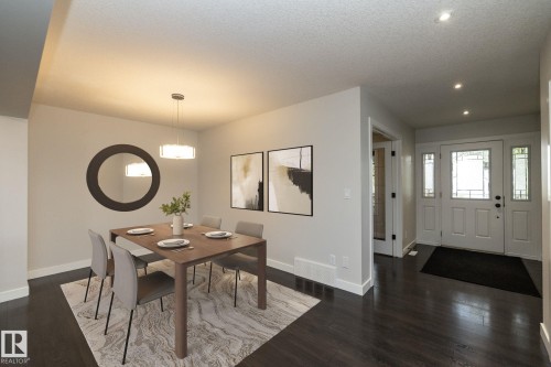 Dark wood-finish flooring throughout - 53 Michigan Street, Devon, AB 