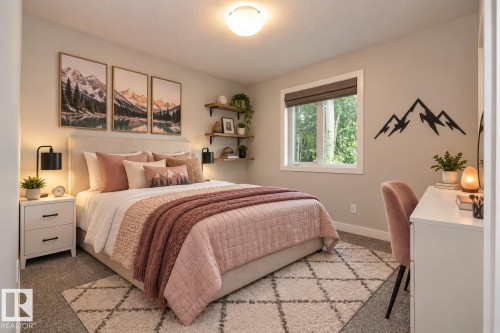 Recessed window with a roller shade, wall-mounted open shelving, wall-mounted light fixtures, built-in closet, and a flush-mount ceiling light - 53 Michigan Street, Devon, AB 