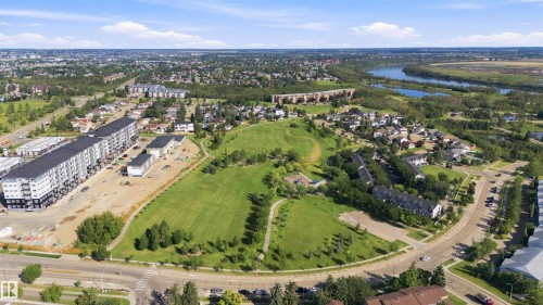 Expansive green spaces with mature trees and a tranquil river setting - 12 Hughes Road Nw, Edmonton, AB 