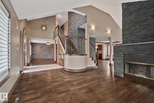 Wood-finish flooring throughout the main level - 10 Eldorado Drive, St. Albert, AB 