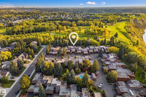 Residential development with mature tree landscaping, bordering a golf course and natural waterway - #23 500 Lessard Dr Nw, Edmonton, AB 