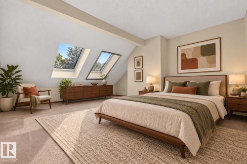 Vaulted ceilings with skylights, soft neutral wall tones, and recessed lighting - #23 500 Lessard Dr Nw, Edmonton, AB 