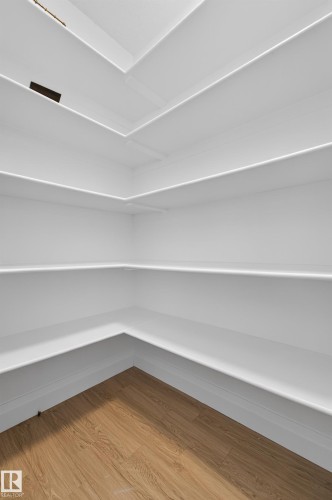 Integrated shelving with clean white finishes - 11167 62 Avenue Nw, Edmonton, AB 