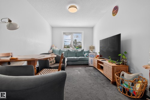 Recessed ceiling light fixture and window with white trim - 11167 62 Avenue Nw, Edmonton, AB 