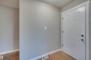 Panel door with brushed nickel hardware - 13815 88 Street Nw, Edmonton, AB 