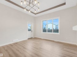 Recessed ceiling design with a contemporary chandelier - 