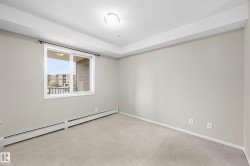 Wall-to-wall carpeting with baseboard heating - 
