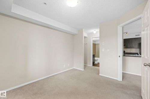 Neutral-toned wall finishes - #215 11804 22 Av Sw, Edmonton, AB 