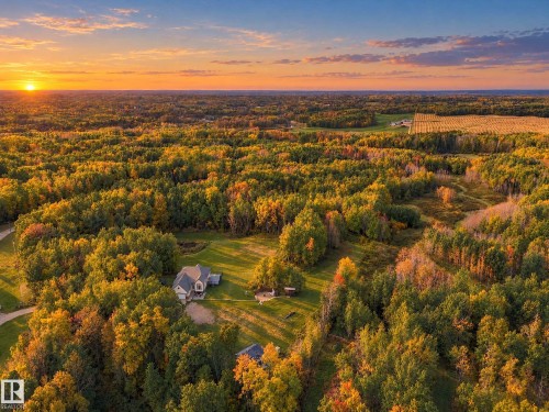 Aerial view of the property at sunset - #7 54020 Hghway 779, Rural Parkland County, AB 