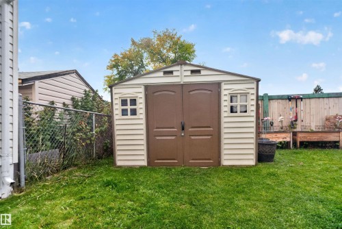 Utility shed with double doors, side windows, and a gabled roof - 1405 53222 Range Road 272, Rural Parkland County, AB 
