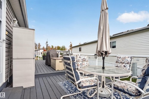 Expansive outdoor deck with gray wood-finish decking - 1405 53222 Range Road 272, Rural Parkland County, AB 