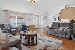 Wood-finish flooring throughout the living space - 