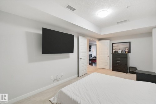 Recessed ceiling features with integrated lighting - #125 5151 Windermere Bv Sw Sw, Edmonton, AB 