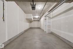 Concrete flooring with a concrete perimeter, unfinished drywall, and exposed ceiling - 