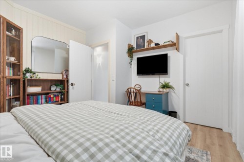 Wood-finish flooring, white walls, and a built-in wood shelf - #45 53122 Rge Road 14, Rural Parkland County, AB 