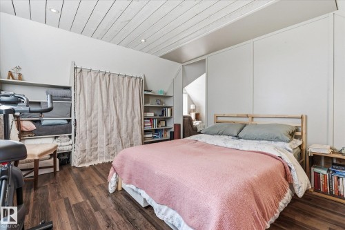 Wood-finish flooring, recessed lighting, built-in shelving, sloped ceiling, and white panel walls - #45 53122 Rge Road 14, Rural Parkland County, AB 