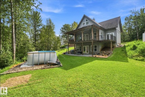 Multi-level back decking, ground-level patio, and an above-ground pool - #45 53122 Rge Road 14, Rural Parkland County, AB 