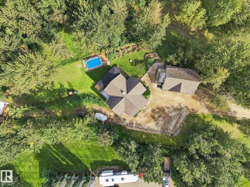 Property with a multi-gabled roofline, an additional structure, and an above-ground pool - #45 53122 Rge Road 14, Rural Parkland County, AB 