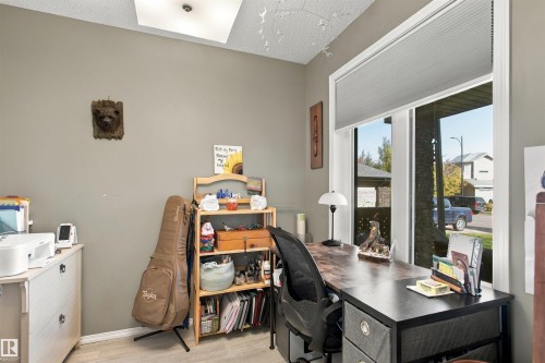 Window with pleated shade, light-tone walls, and a ceiling-mounted light fixture - 38 Red Tail Way, St. Albert, AB 