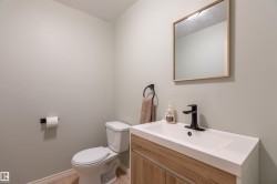 White integrated sink with a matte black faucet - 
