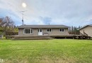 Hillside Bungalow view of the front of the house - 9131 Township Road 554, Rural St. Paul County, AB 