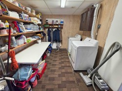 Downstairs laundry with storage space - 