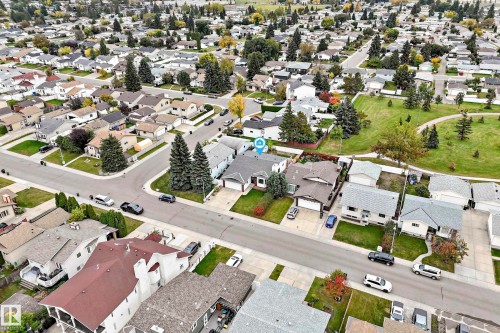 Neighborhood setting with mature trees and paved streets - 7307 152C Avenue Nw, Edmonton, AB 