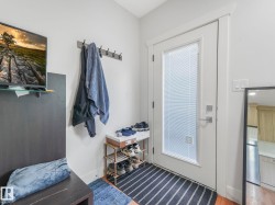 Entry door with a privacy pane and polished chrome hardware - 