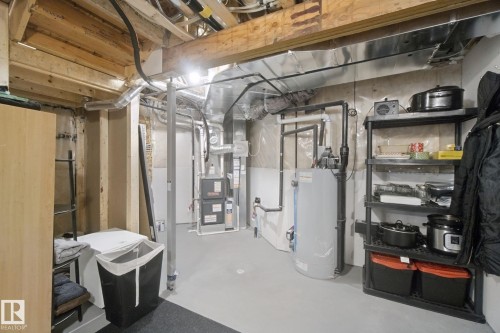 Exposed wood ceiling joists and beams - 153 Cavanagh Common Sw, Edmonton, AB 