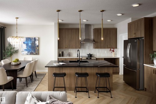 Modern kitchen featuring wood-finish cabinetry, a black appliance suite, and an expansive island with a dark countertop - 16 Clichy Close, St. Albert, AB 