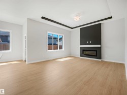 Recessed ceiling detail with an attached flush-mount light fixture - 
