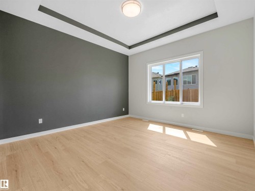 Tray ceiling with recessed lighting element - 22 Dalquist Bay, Leduc, AB 