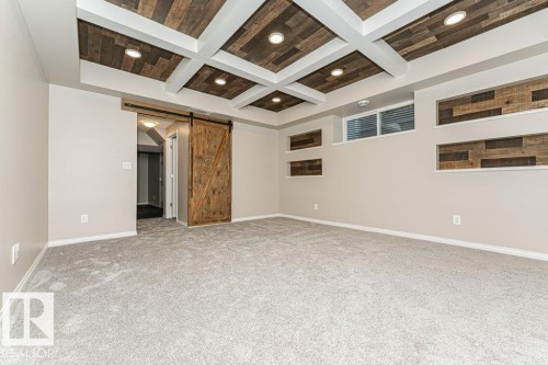 Coffered ceiling with wood-finish panels and recessed lighting - 3203 Carpenter Landing Sw, Edmonton, AB 