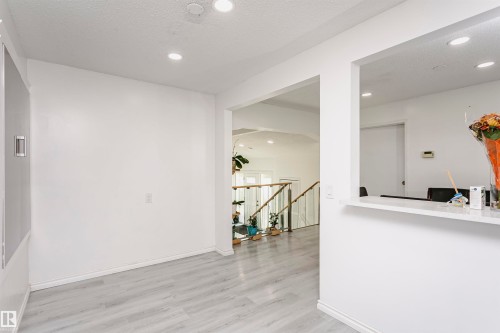 Recessed lighting and light wood-finish flooring - 7204 92B Avenue Nw, Edmonton, AB 