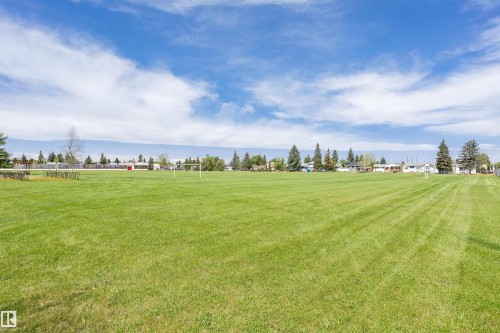 Expansive green space featuring a large grassy field - 7204 92B Avenue Nw, Edmonton, AB 