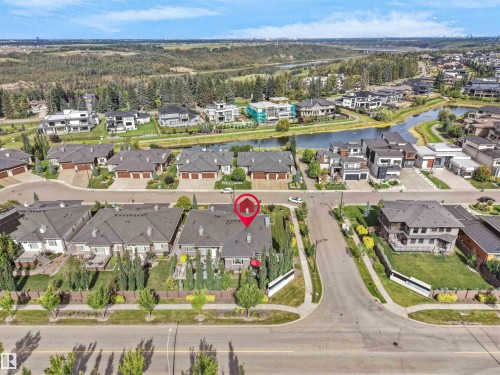 Property featuring a private backyard, mature landscaping, and a paved driveway - 904 Wood Place Nw, Edmonton, AB 
