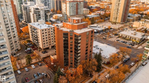 Multi-story building featuring numerous private balconies and an integrated parking area - #12A 10050 118 St Nw, Edmonton, AB 