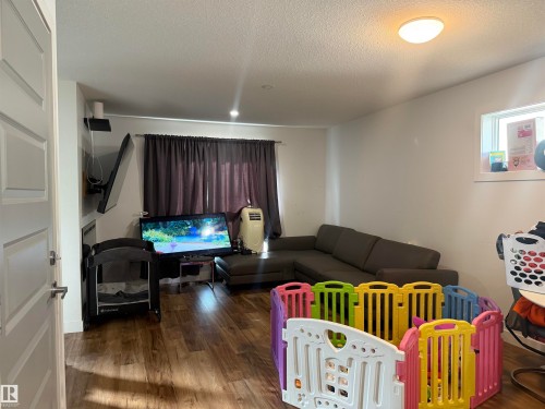 Wood-finish flooring throughout - 11442 82 Street Nw, Edmonton, AB 