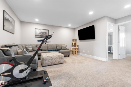 Recessed lighting, light-toned carpeting, and white trim - 3334 Parker Loop Sw, Edmonton, AB 