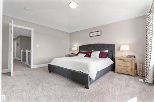 Neutral-toned walls, recessed ceiling light, and carpeted flooring - 3334 Parker Loop Sw, Edmonton, AB 