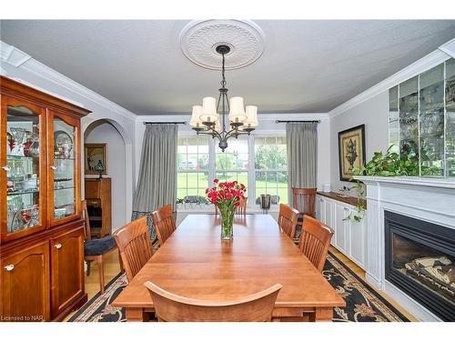 717 Metler Road, Fenwick, ON - Indoor Photo Showing Dining Room With Fireplace