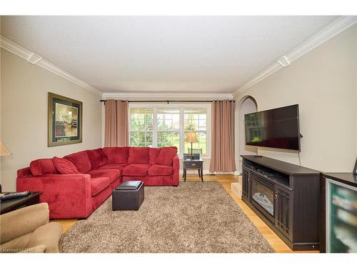 717 Metler Road, Fenwick, ON - Indoor Photo Showing Living Room With Fireplace